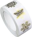 Paper stickers on a roll: snowflakes